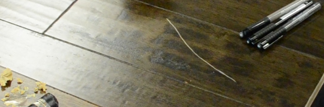 white scratch on wood floor